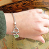 t-bar bracelet with green stone
