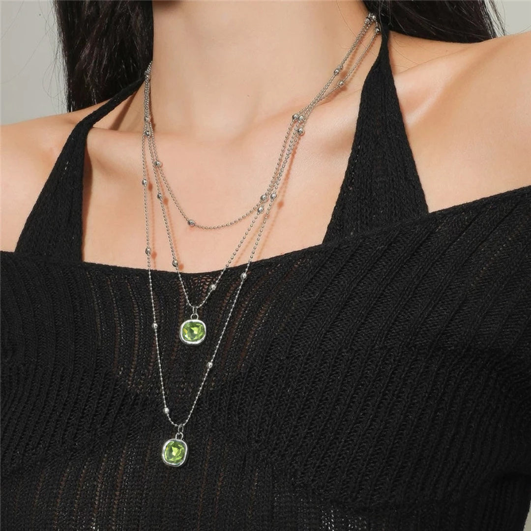 necklace with 2 green pendants